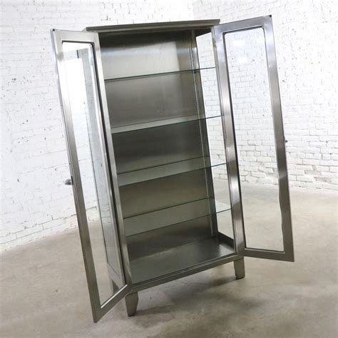 stainless steel glass display cabinet|hanging steel cabinet.